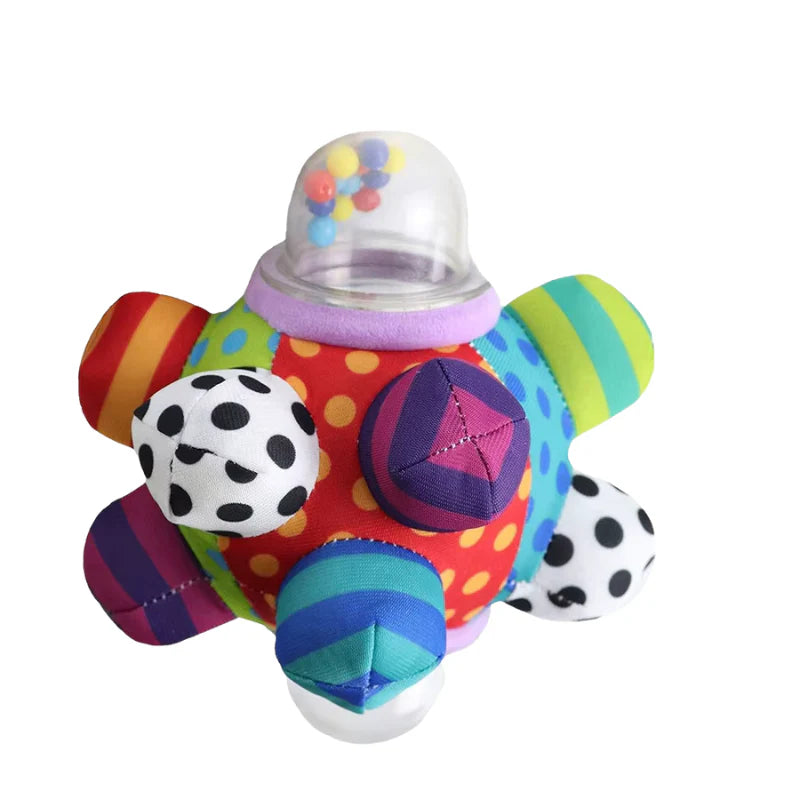 Färgglad babyskallra i mjukt plyschmaterial, perfekt för små händer